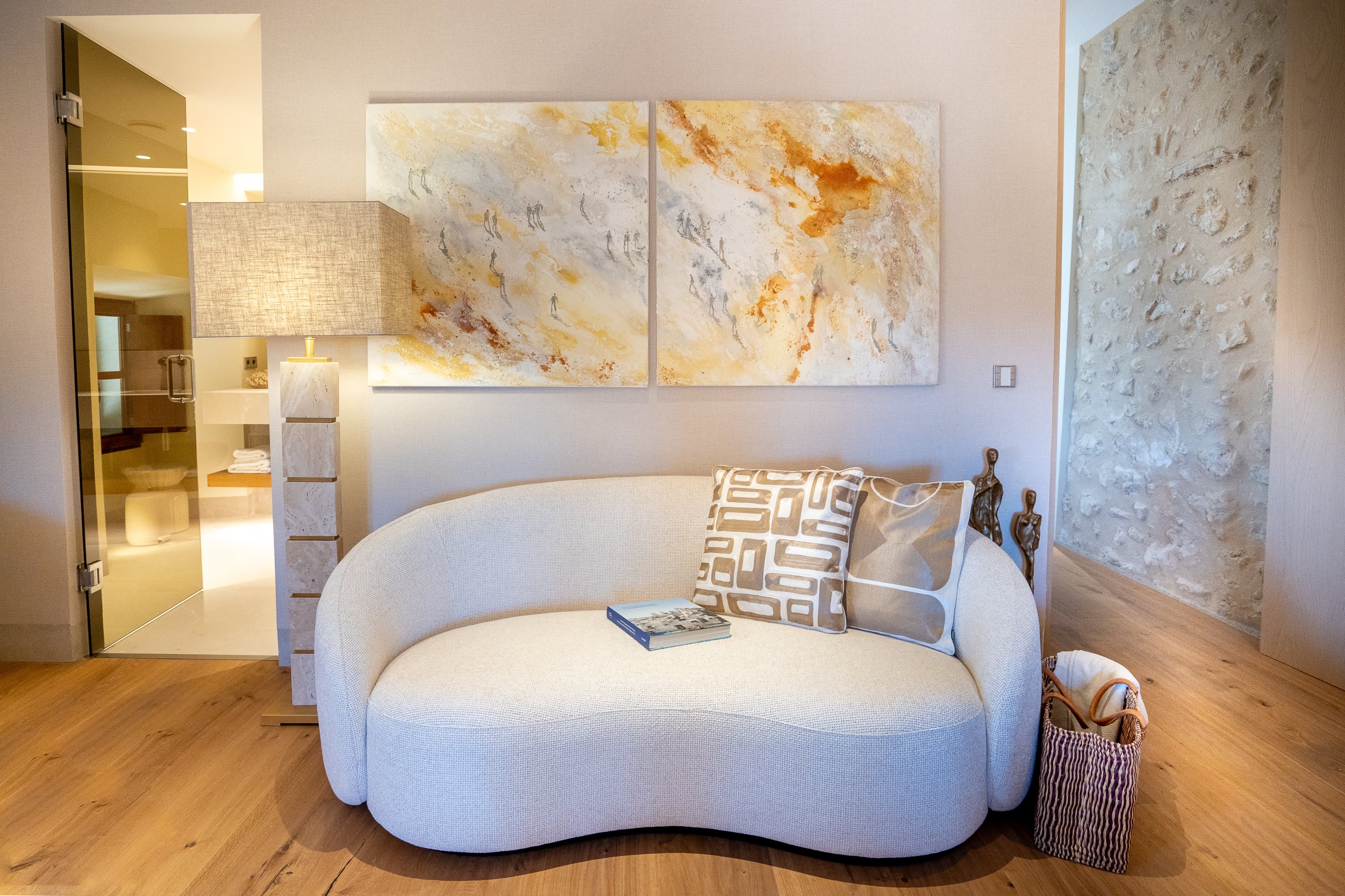Adjoining premium room with a king bed and elegant sofa bed.