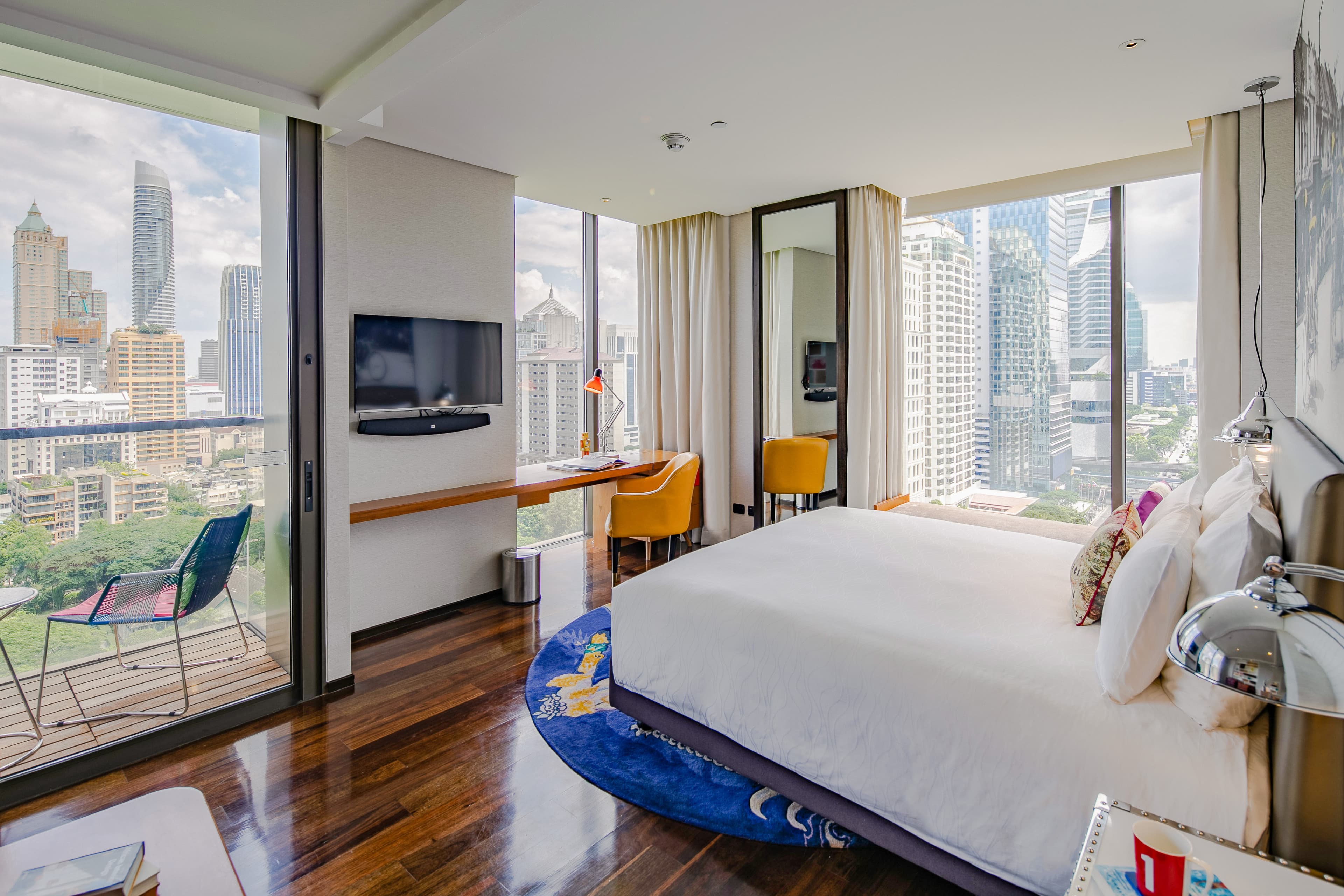 Stay in comfort with stunning views of Bangkok's skyline.